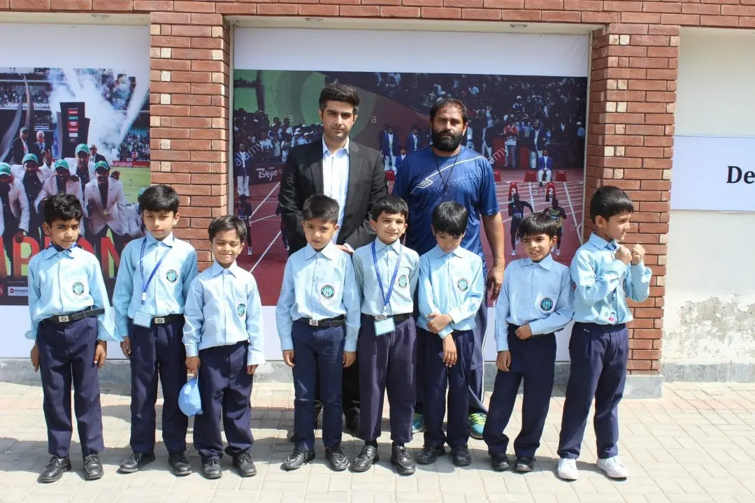 Students and teachers of The Punjab School outside the school building