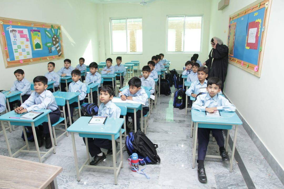 Students seated at their desks during a lesson