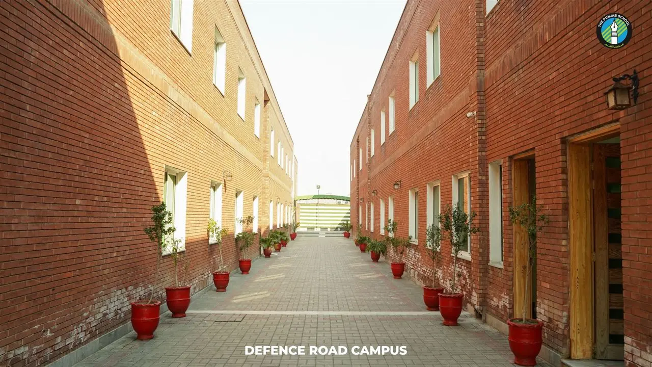 Brick walkway between the classroom blocks at the Defence Road Campus